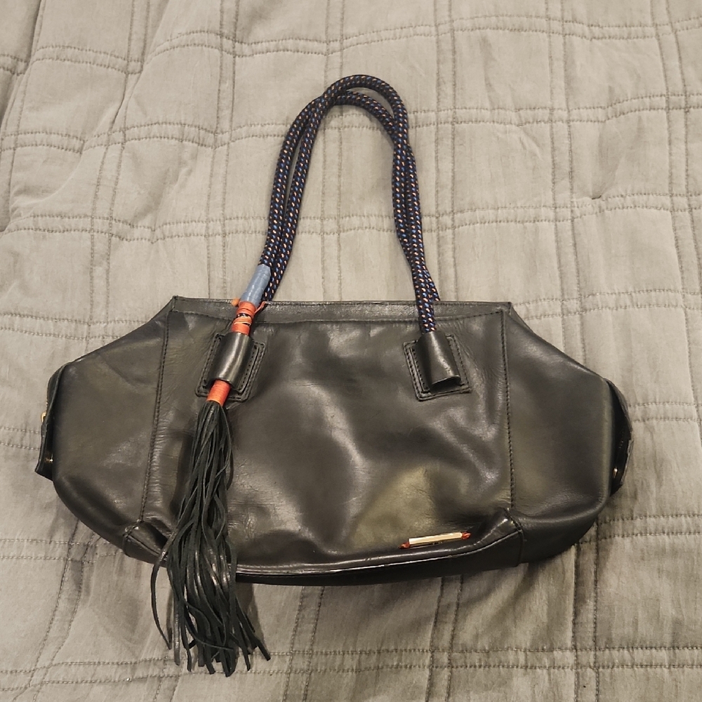 Chic Velez Black Leather Hobo Bag with Tassel